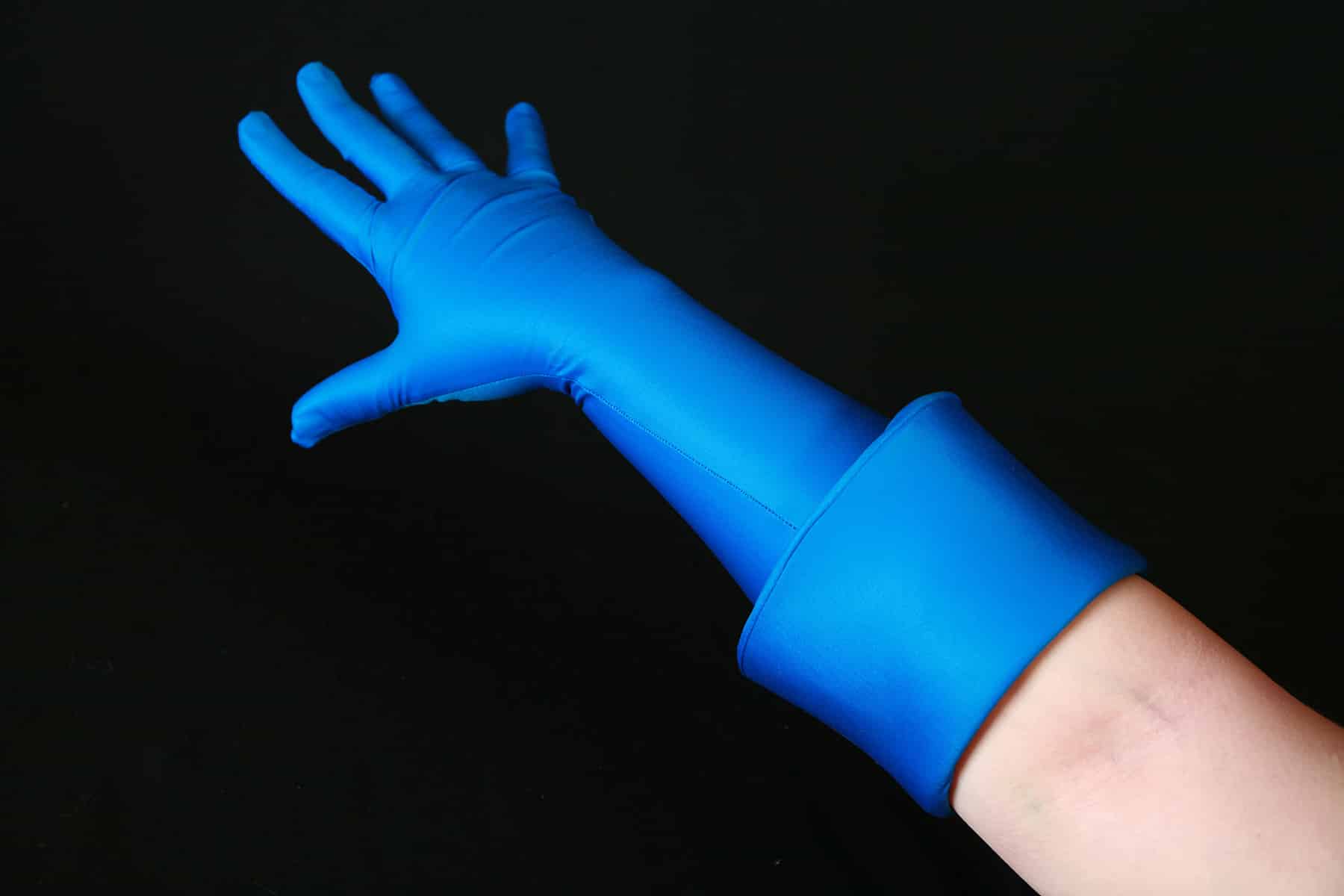 An elbow length blue glove with a wide blue cuff.