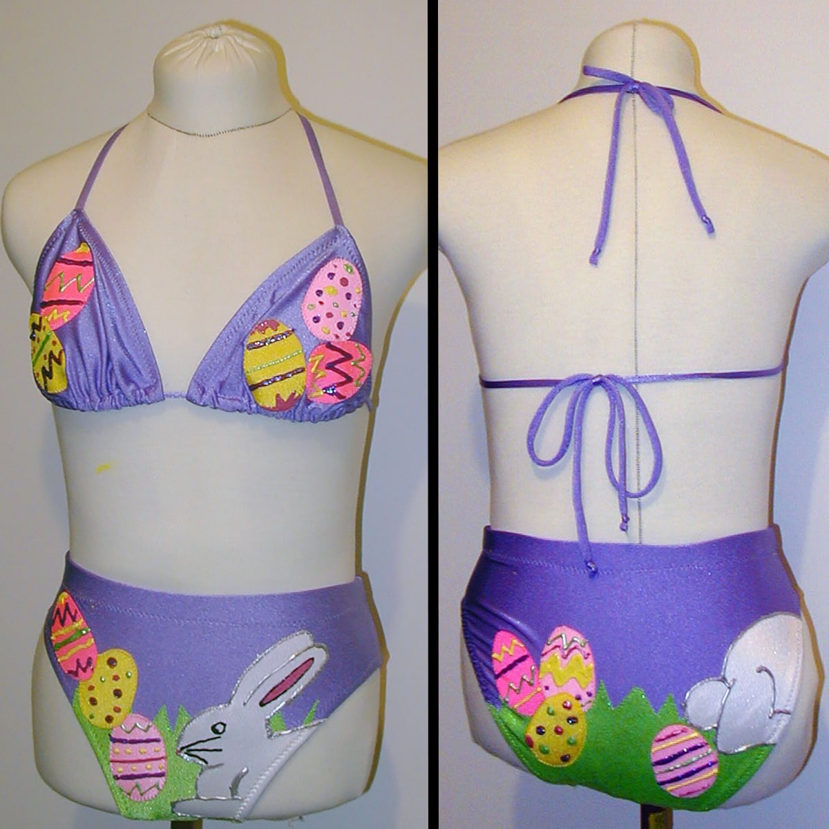 Front and back views of a light purple bikini decorated in an Easter theme.
