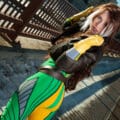 A gorgeous cosplayer dressed as a stylized version of X-Men's Rogue.