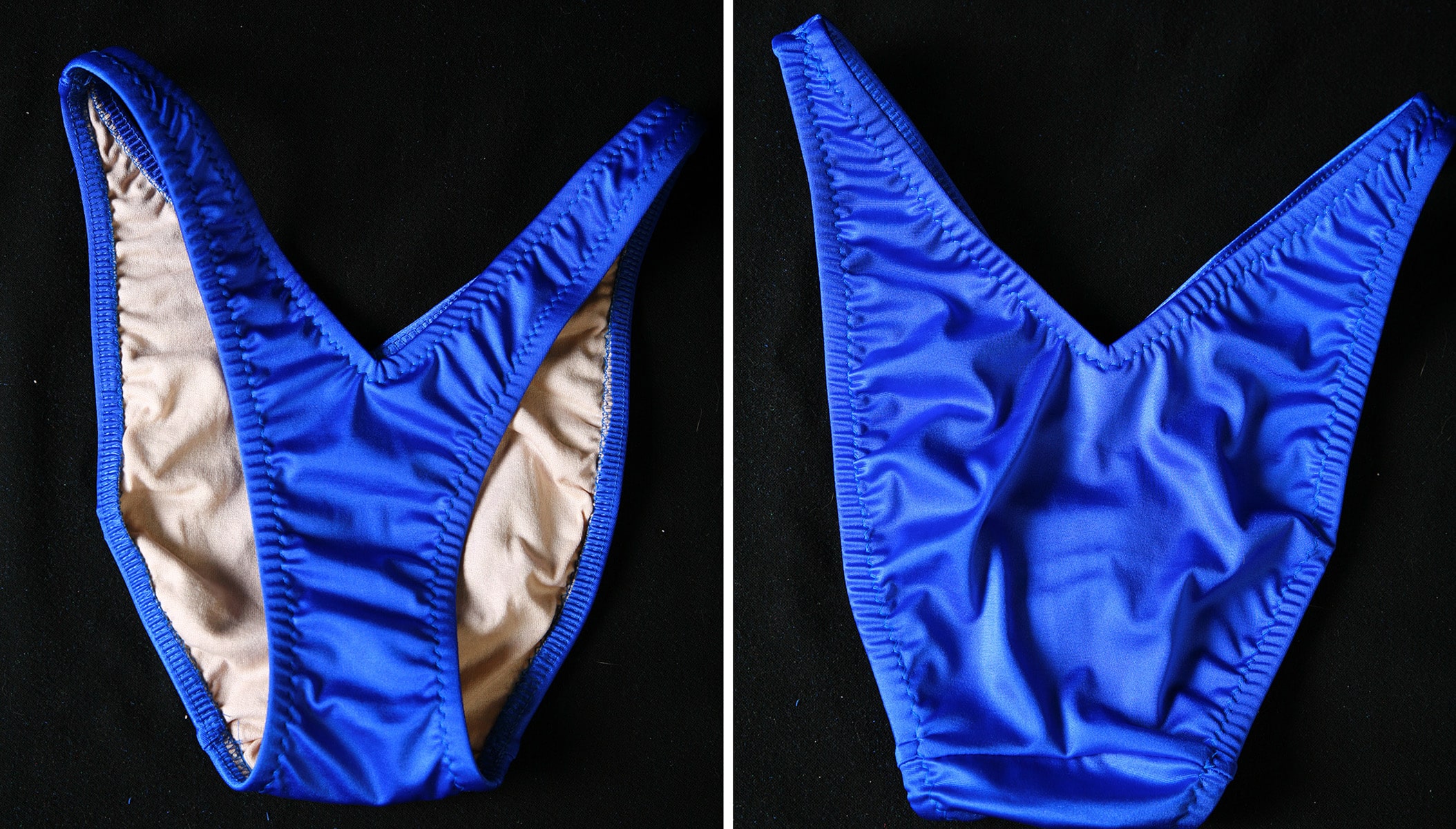 Front and back views of a blue V cut bikini bottom, on a black backdrop.