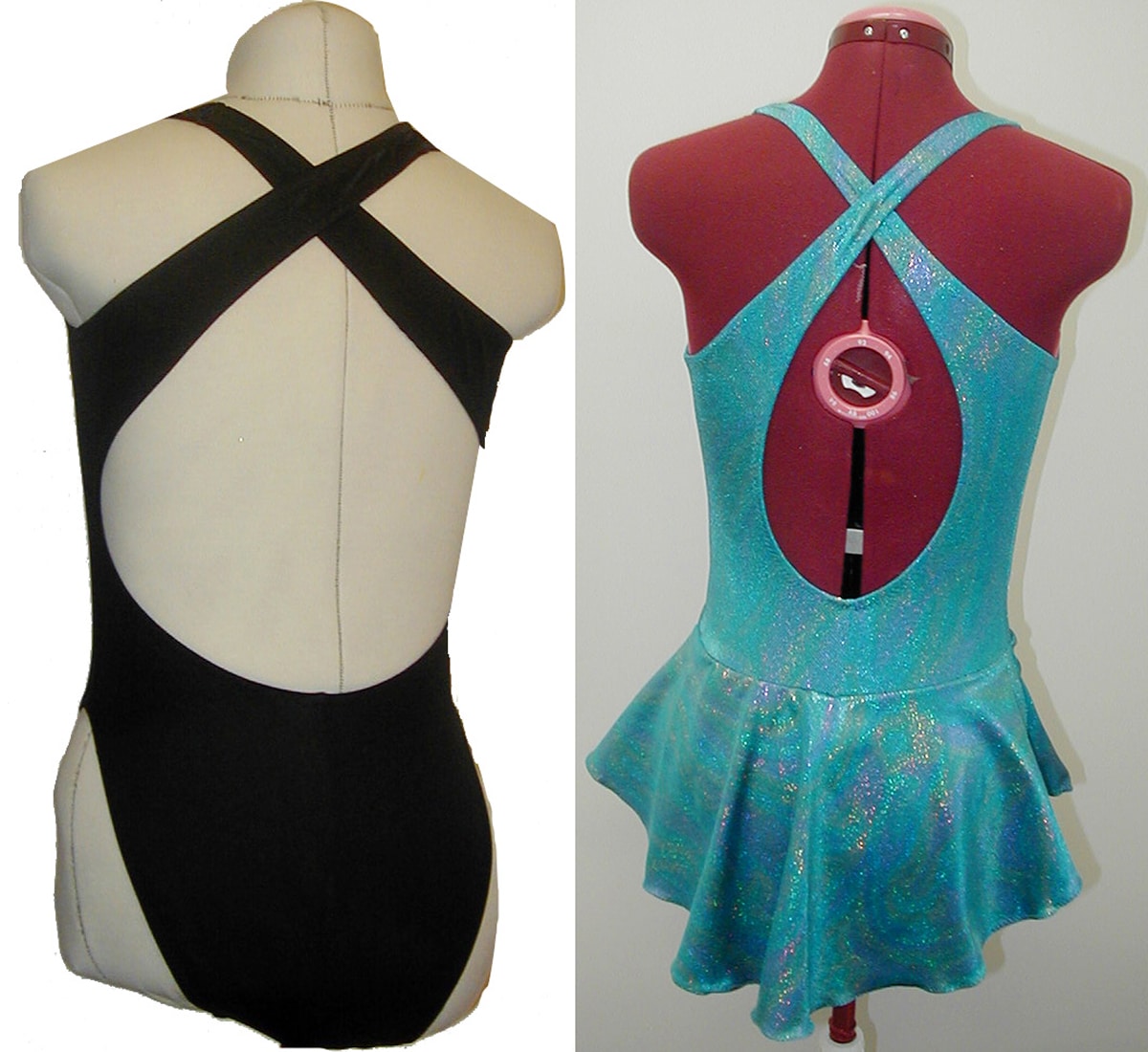 Back views of a black swimsuit and a blue skating dress, both with a crossover back.