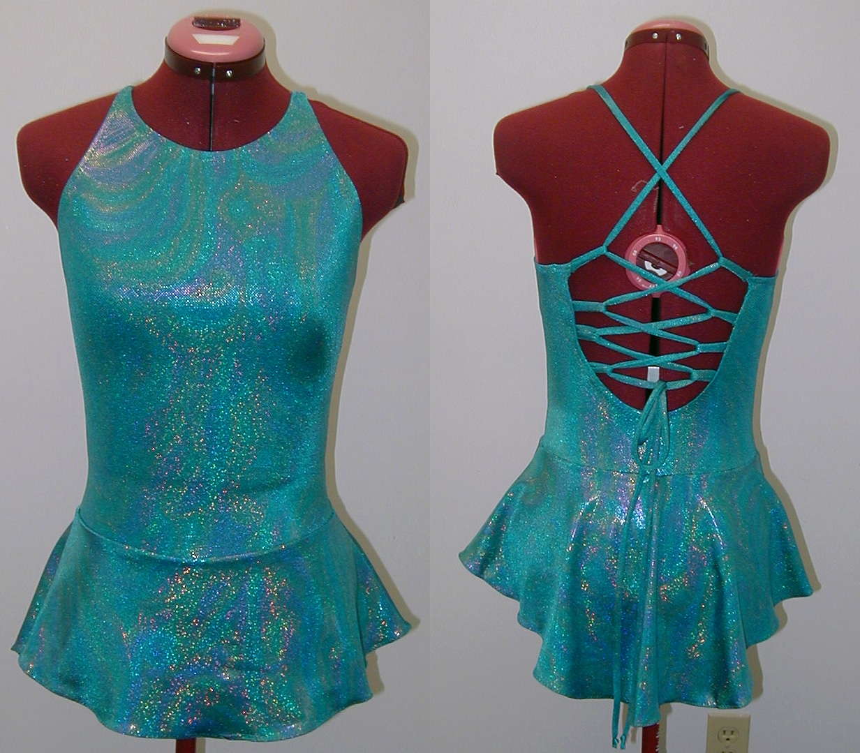 Front and back views of a lace up back skating dress.