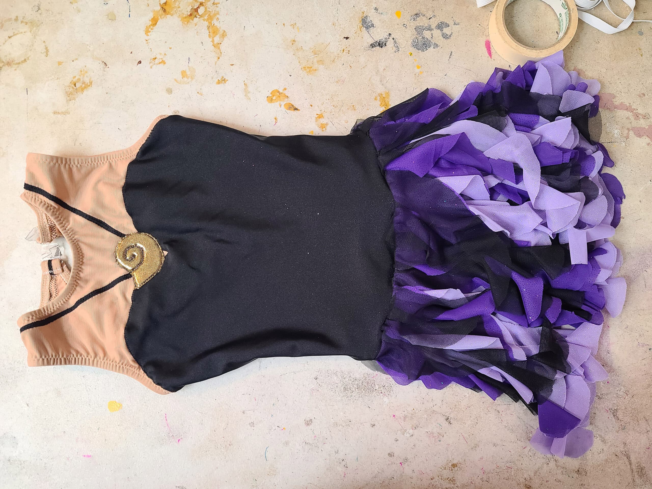 The ursula figure skating dress laid out on a sewing table.