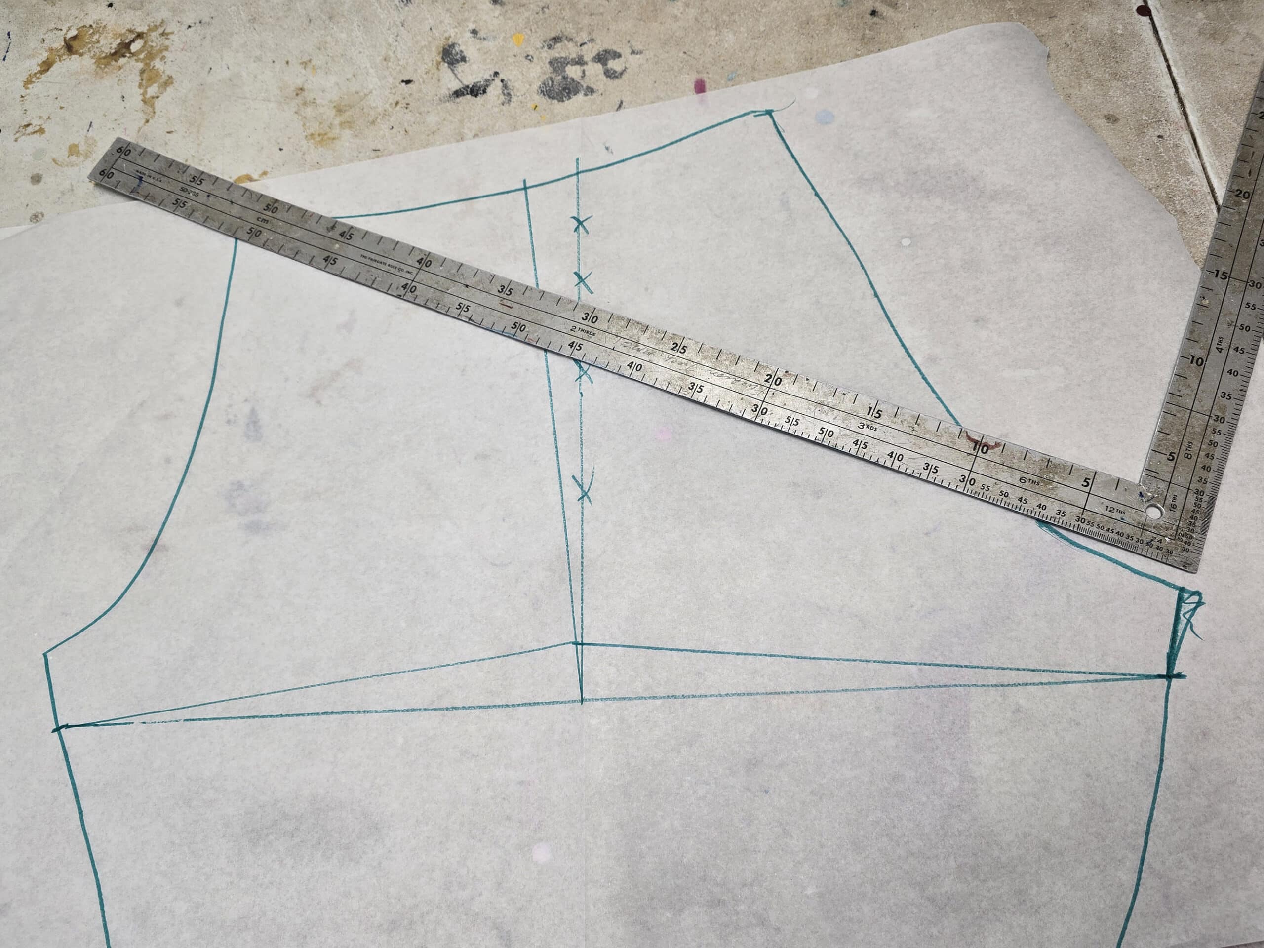 The booty shorts pattern with the side rise in the leg opening drawn in with a ruler.